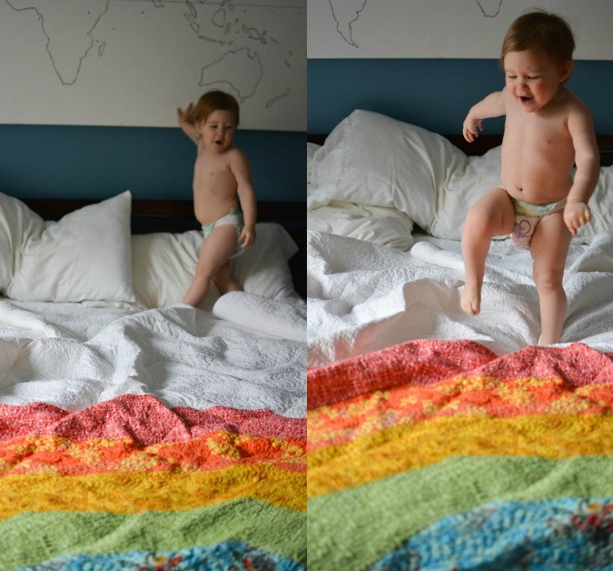 giant rainbow quilt stomping baby collage